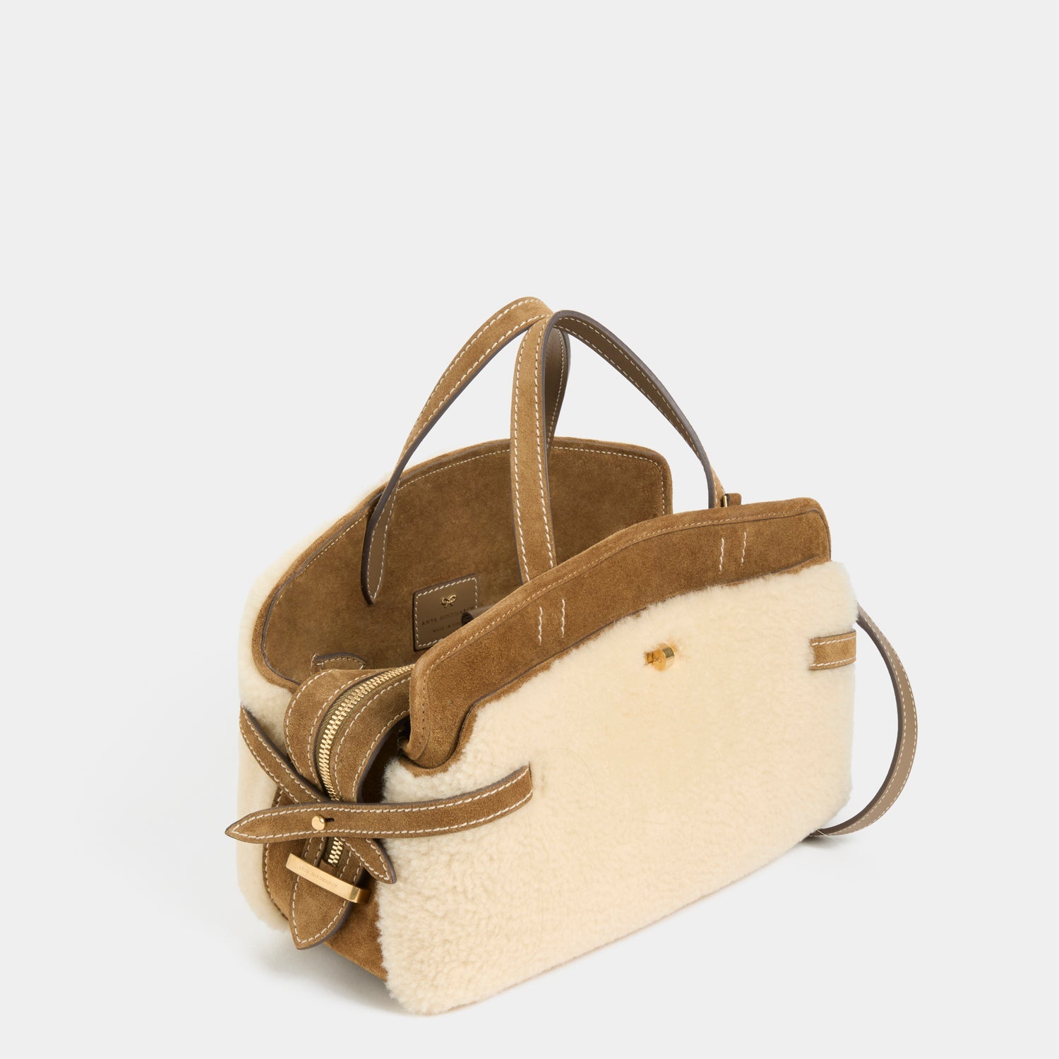 Wilson Shearling Cross-body -

          
            Shearling/Suede Leather in Moutarde -
          

          Anya Hindmarch EU
