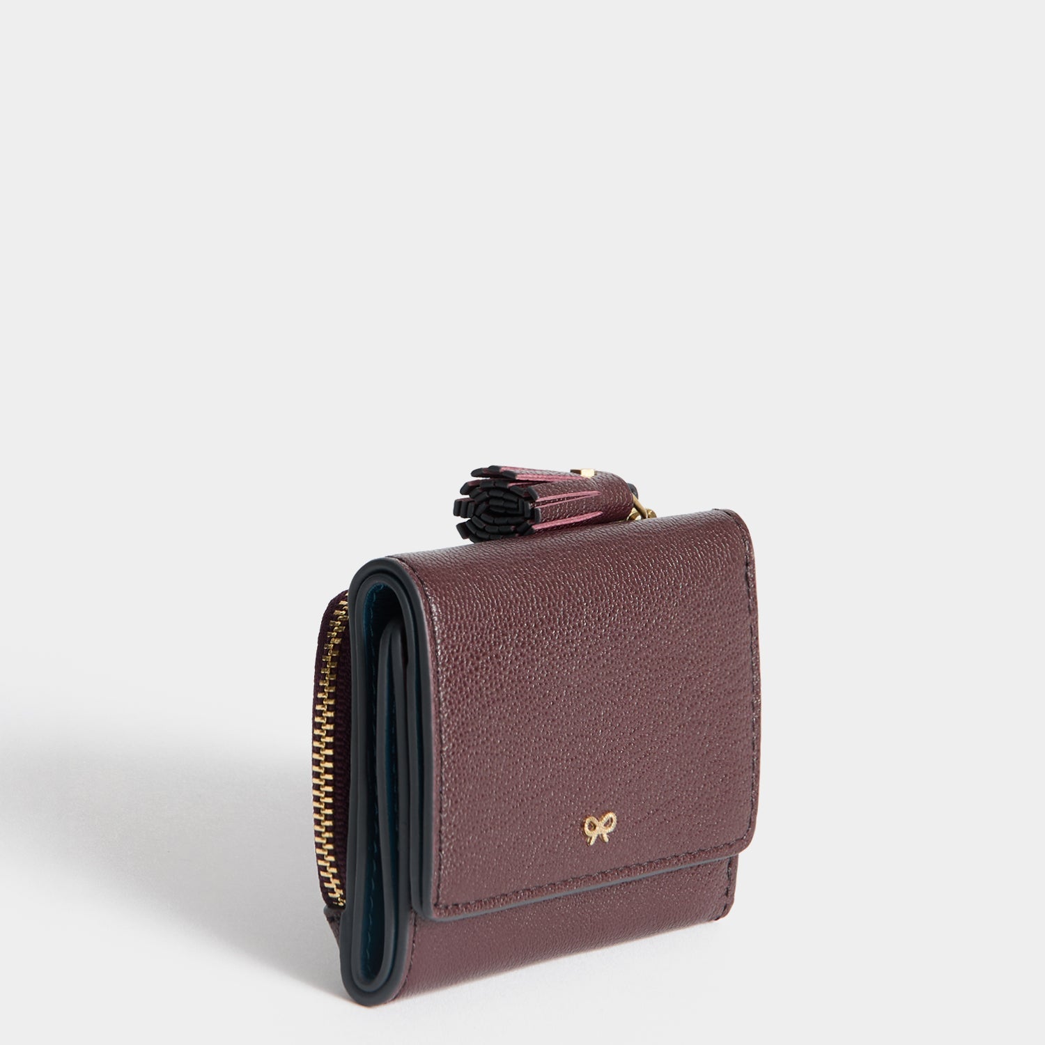 Peeping Eyes Mini Trifold Wallet -

          
            Capra Leather in Claret -
          

          Anya Hindmarch EU
