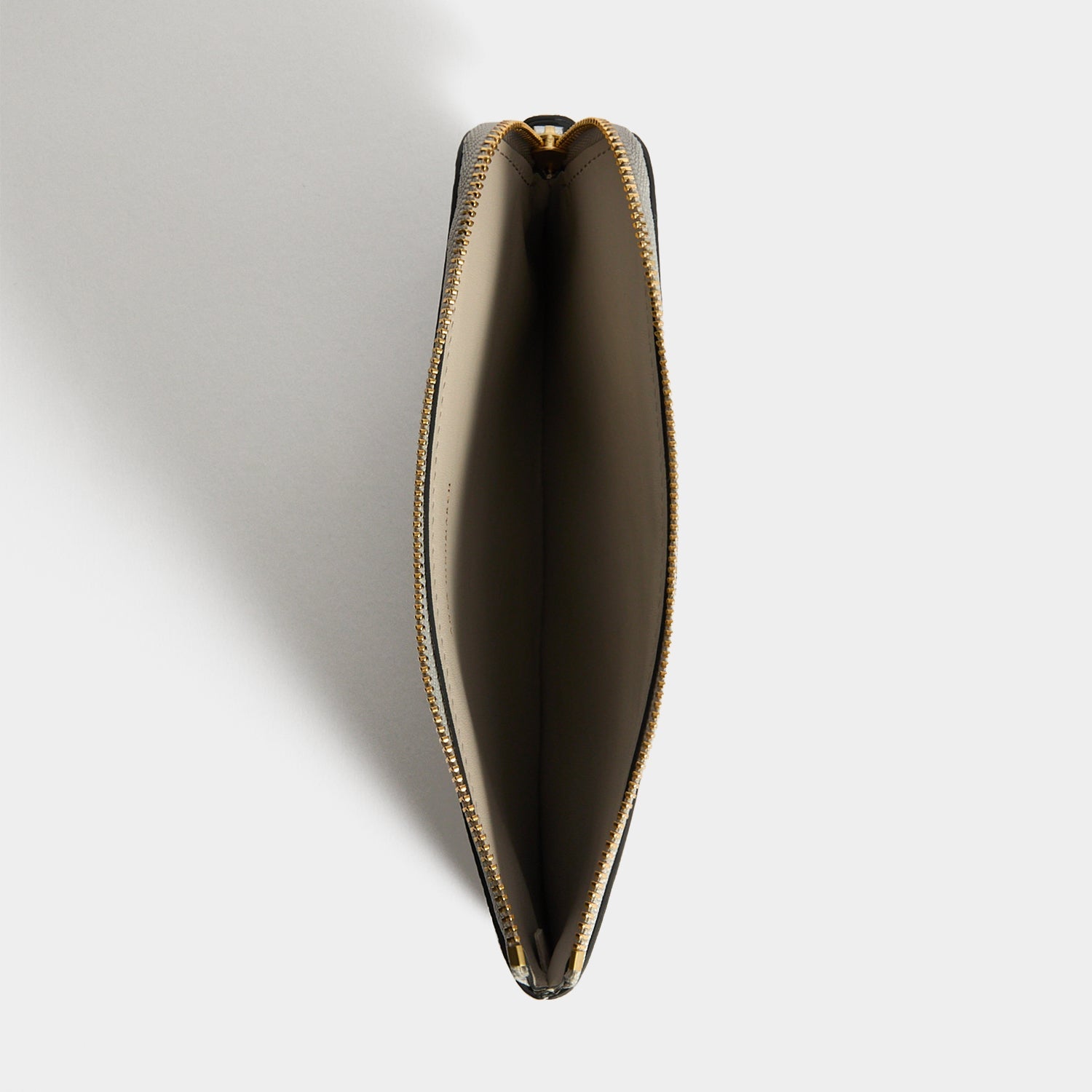 Anya Brands BAND-AID® Brand Zip Loose Pocket -

          
            Capra Leather in Silver -
          

          Anya Hindmarch EU
