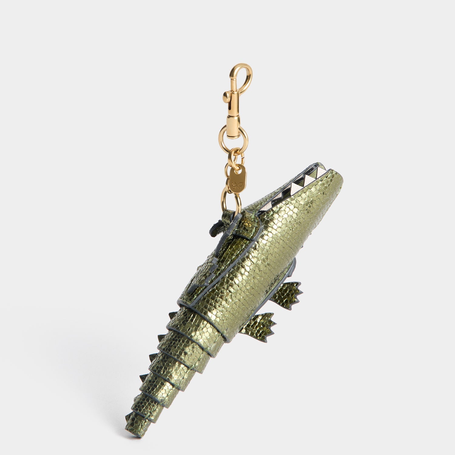 Crocodile Charm -

          
            Metallic Leather in Salvia green -
          

          Anya Hindmarch EU

