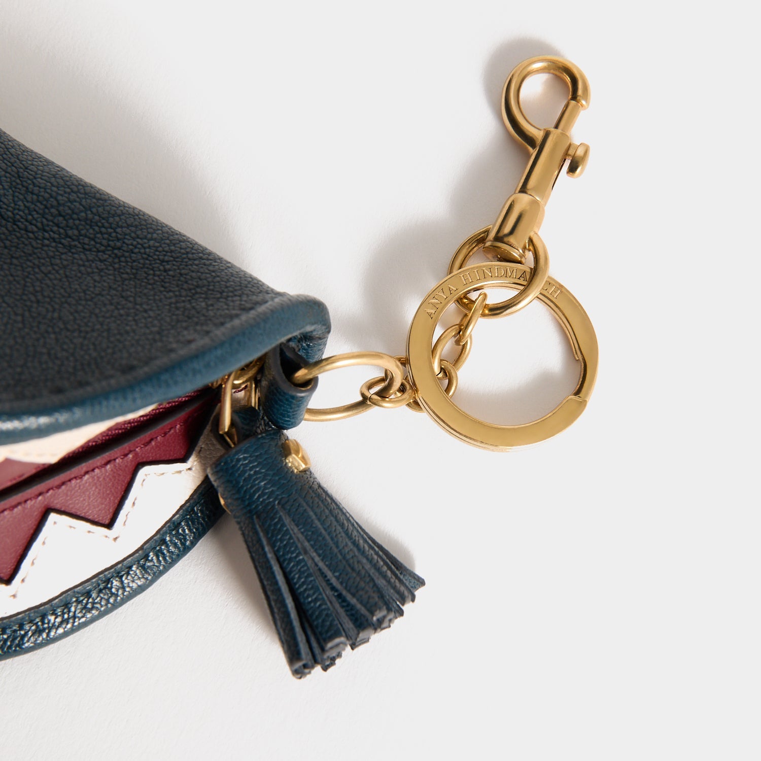 Shark Teeth Ear Pods Pouch Charm -

          
            Capra Leather in Petrol Blue -
          

          Anya Hindmarch EU
