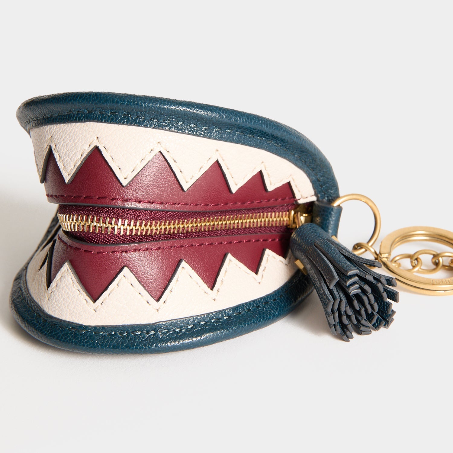 Shark Teeth Ear Pods Pouch Charm -

          
            Capra Leather in Petrol Blue -
          

          Anya Hindmarch EU
