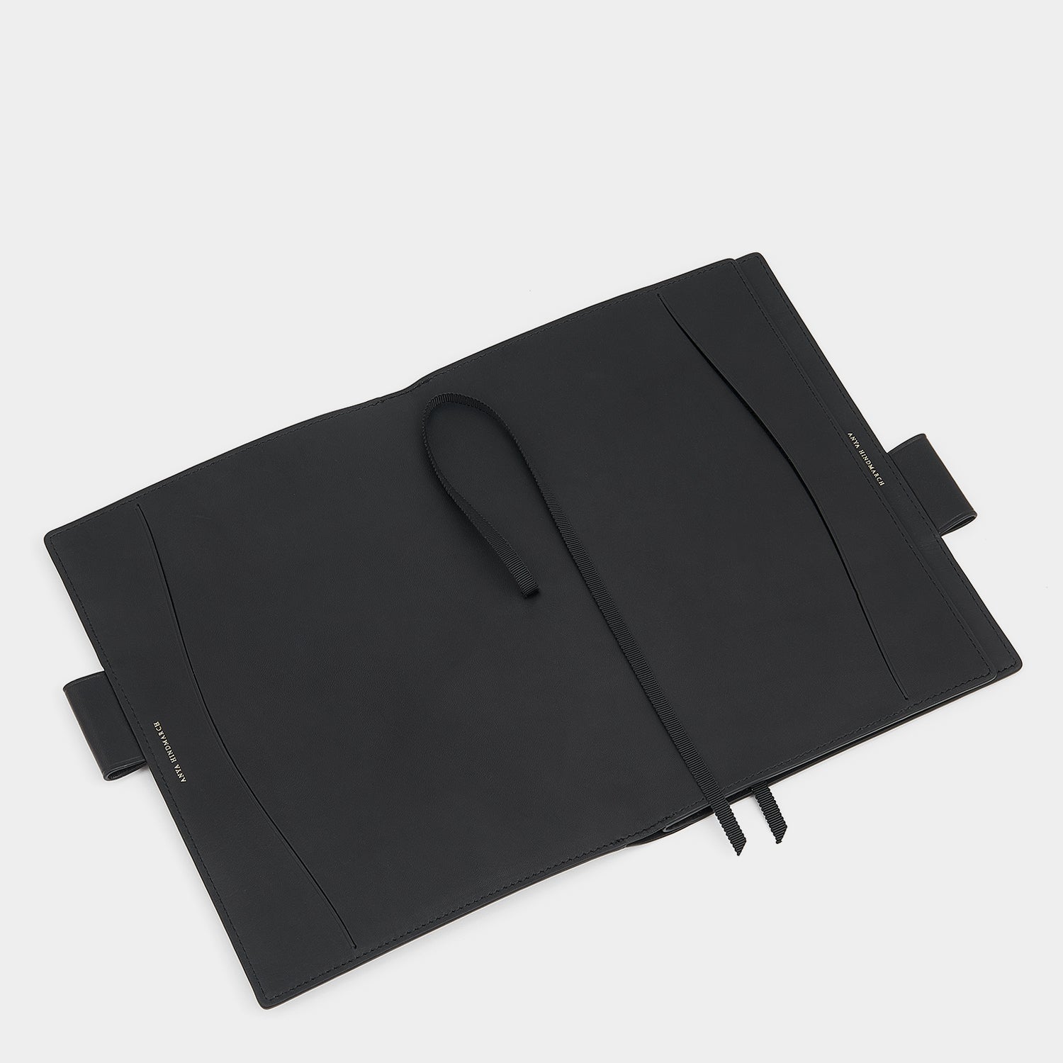 Bespoke A6 Two Way Journal -

                  
                    Butter Leather in Black -
                  

                  Anya Hindmarch EU
