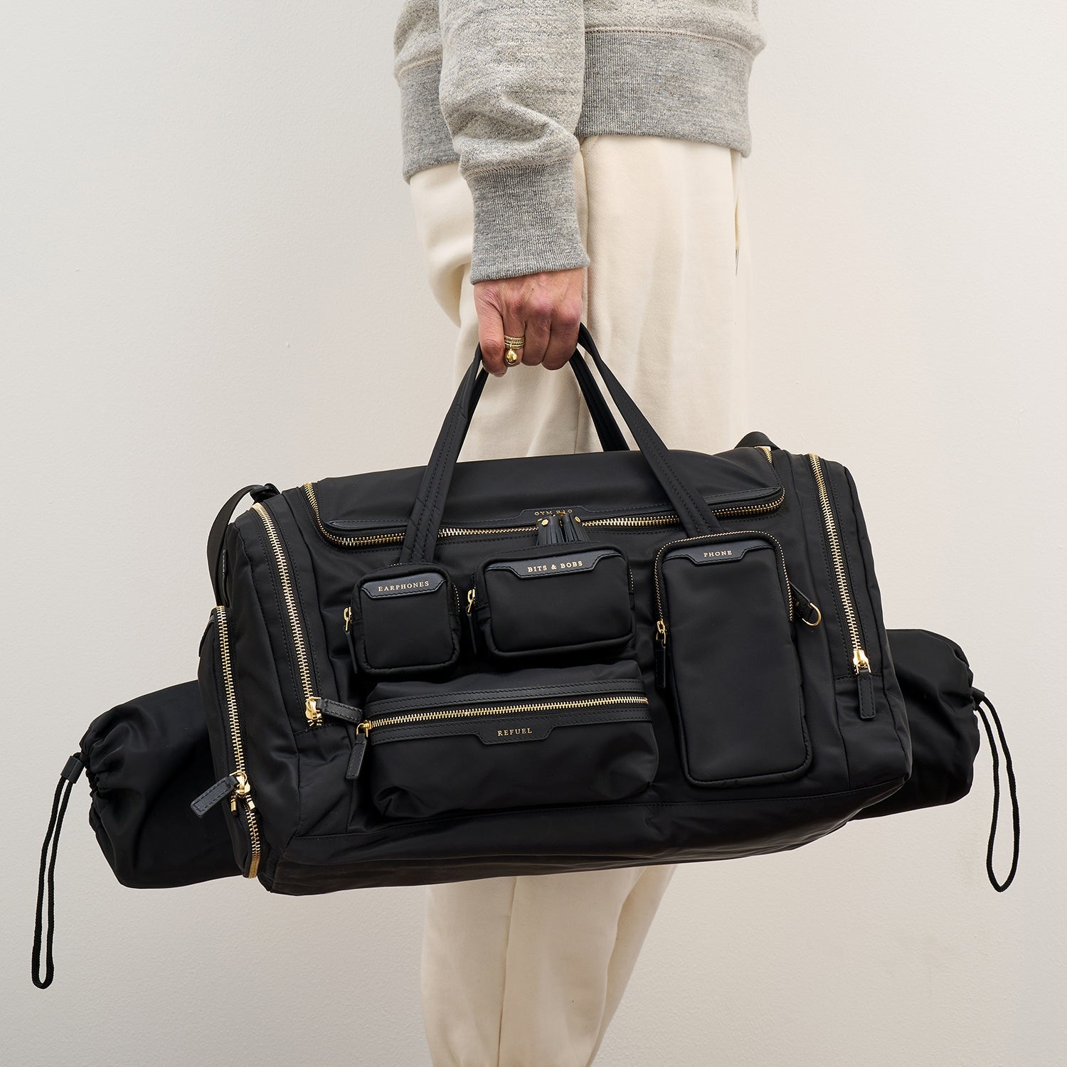 Gym Bag -

          
            Regenerated ECONYL® Nylon in Black -
          

          Anya Hindmarch EU
