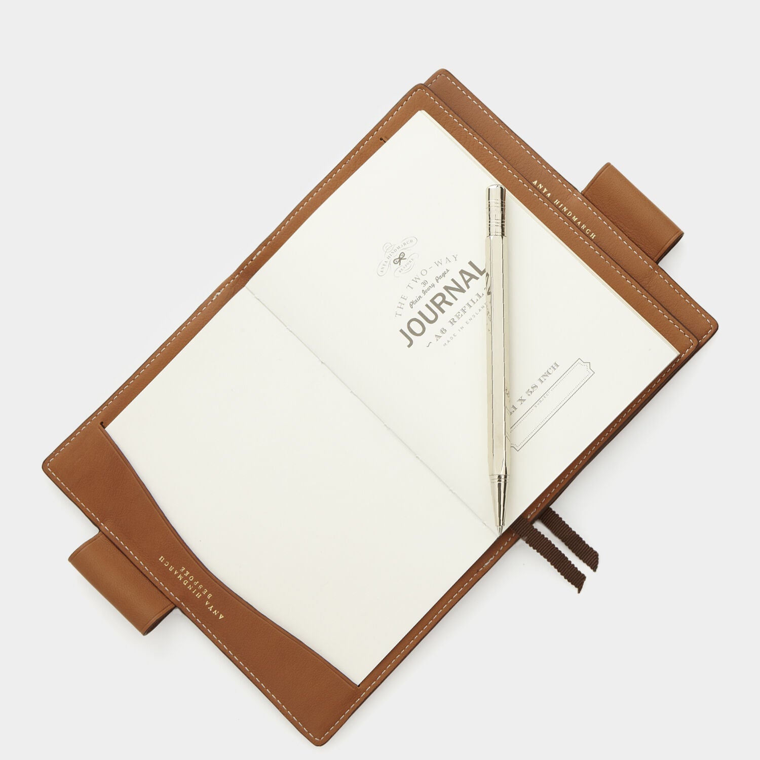 Bespoke A6 Two Way Journal -

                  
                    Butter Leather in Tan -
                  

                  Anya Hindmarch EU
