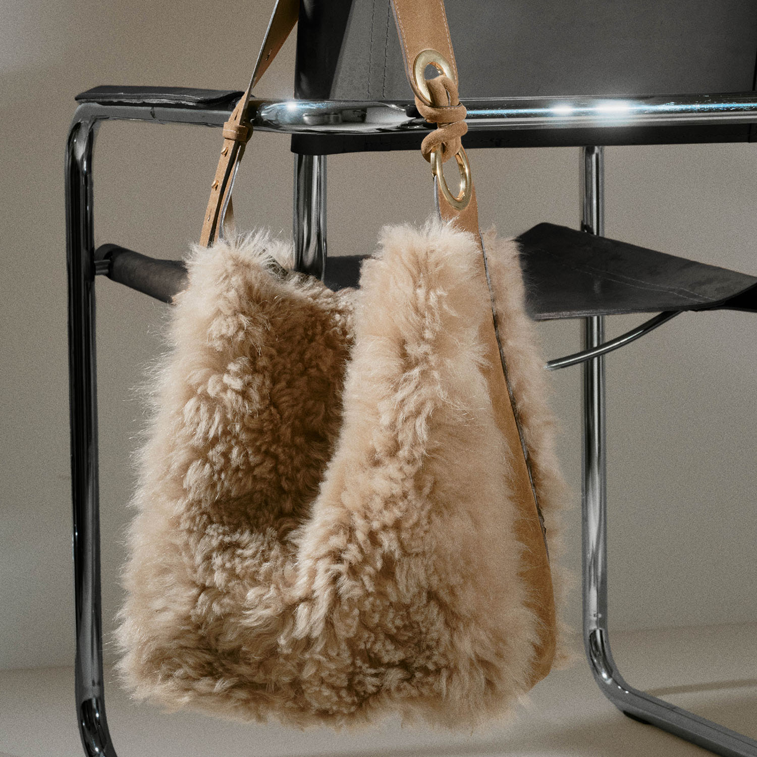 Ringo Shearling Shoulder Bag -

          
            Shearling in Taupe -
          

          Anya Hindmarch EU
