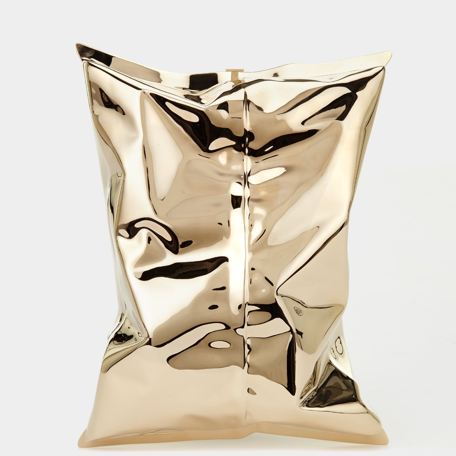 Crisp Packet Clutch -

                  
                    Brass in Pale Gold -
                  

                  Anya Hindmarch EU
