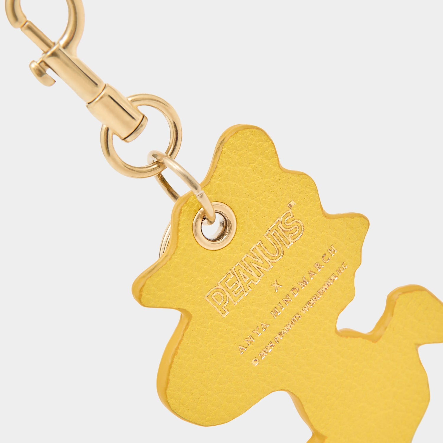 Peanuts Woodstock Key Charm -

          
            Capra Leather in Yellow -
          

          Anya Hindmarch EU
