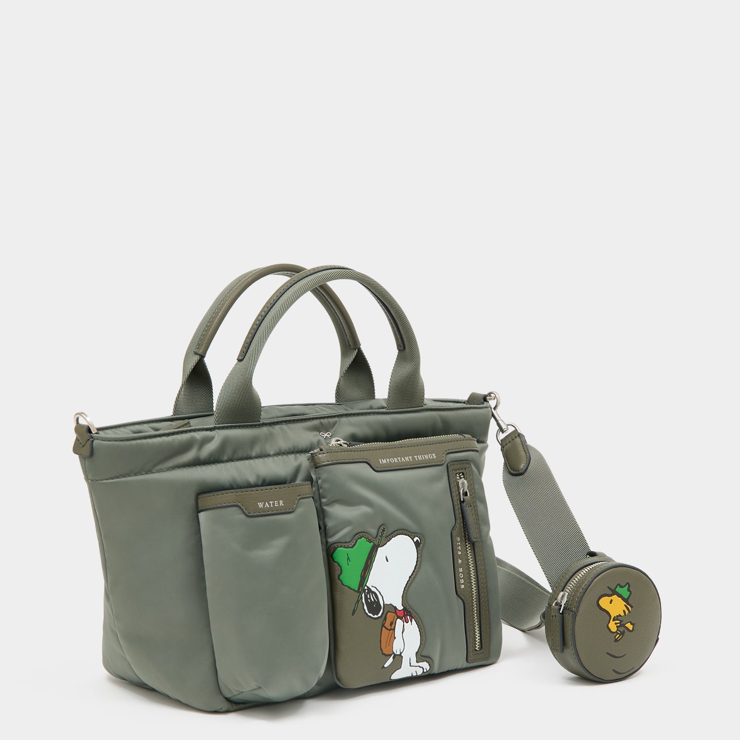 Peanuts Snoopy E/W Mini Tote -

          
            Recycled padded fabric in Fern Green -
          

          Anya Hindmarch EU
