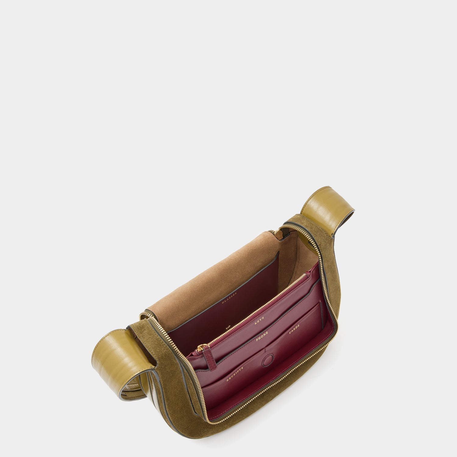 Green suede shoulder bag with adjustable strap by Anya Hindmarch