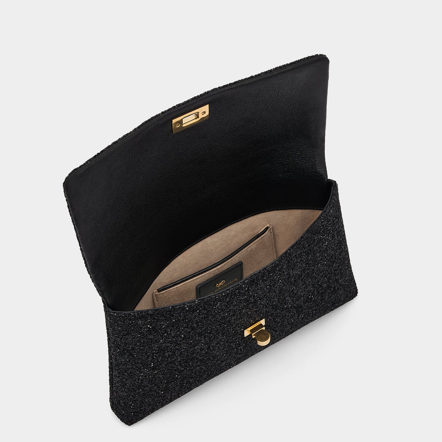 Valorie Clutch -

          
            Glitter in Black -
          

          Anya Hindmarch EU
