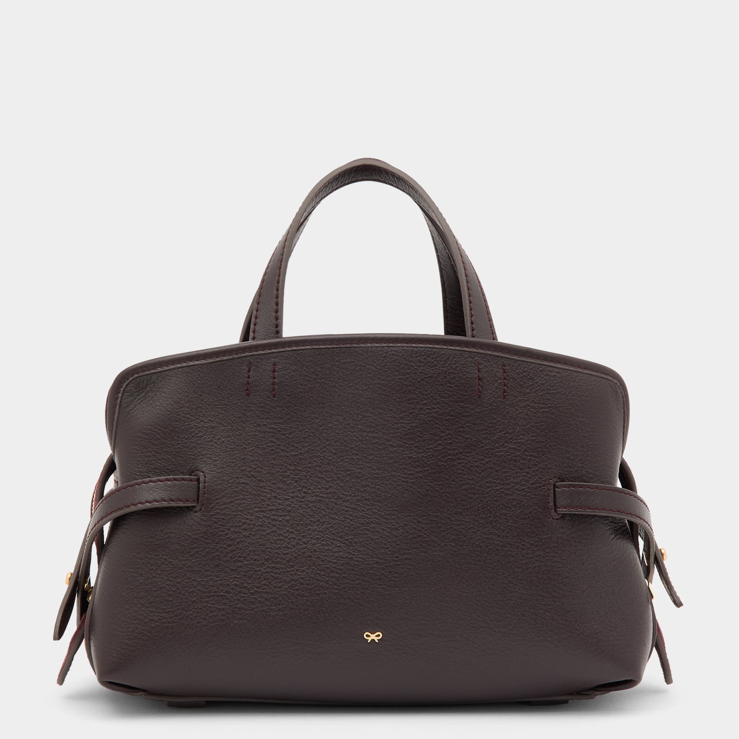 Grape suede and leather cross body bag with adjustable strap by Anya Hindmarch