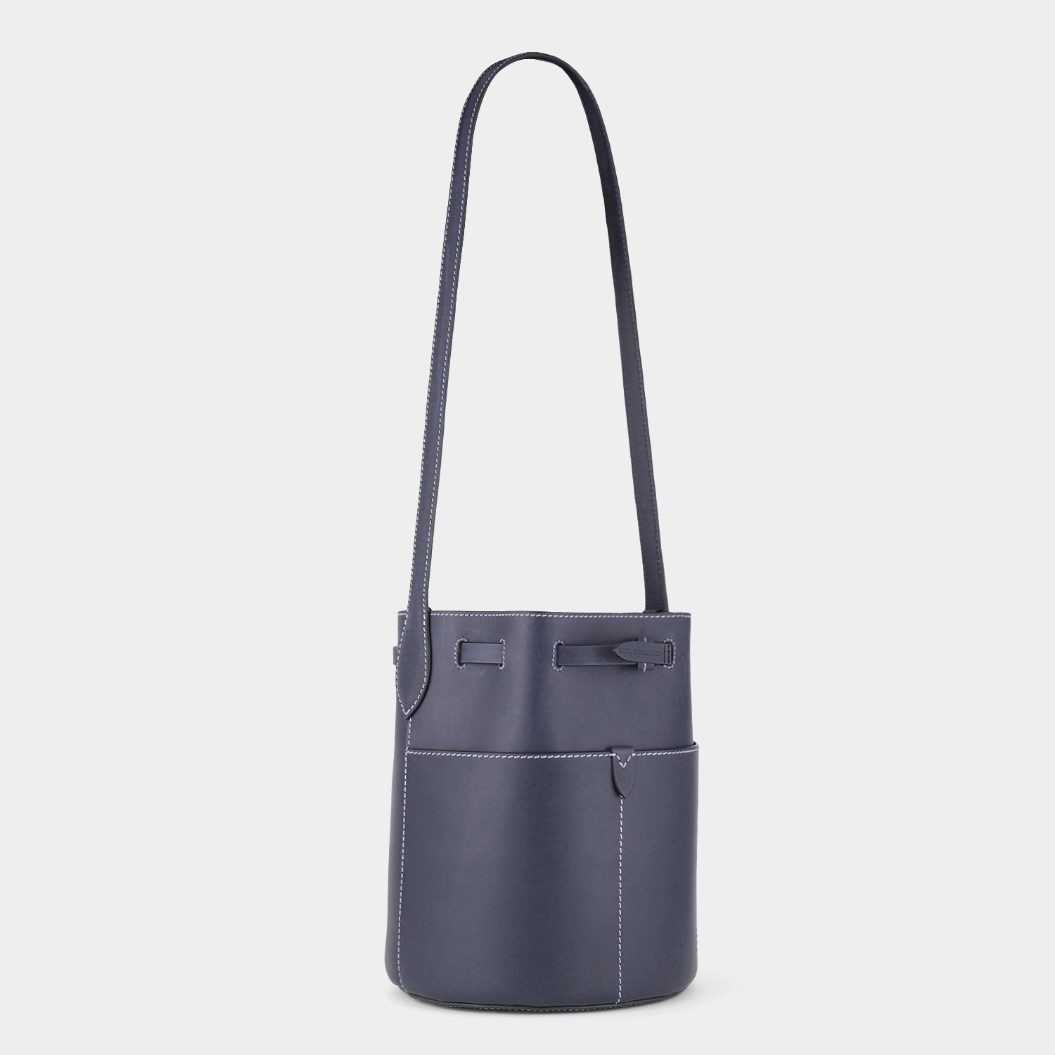 Return to Nature Small Bucket Bag -

          
            Compostable Leather in Marine -
          

          Anya Hindmarch EU
