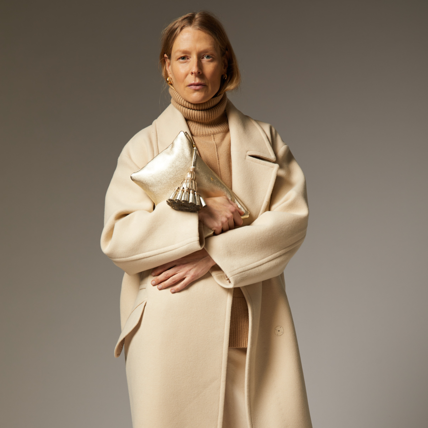 Georgiana Clutch -

                  
                    Metallic Leather in Light Gold -
                  

                  Anya Hindmarch EU
