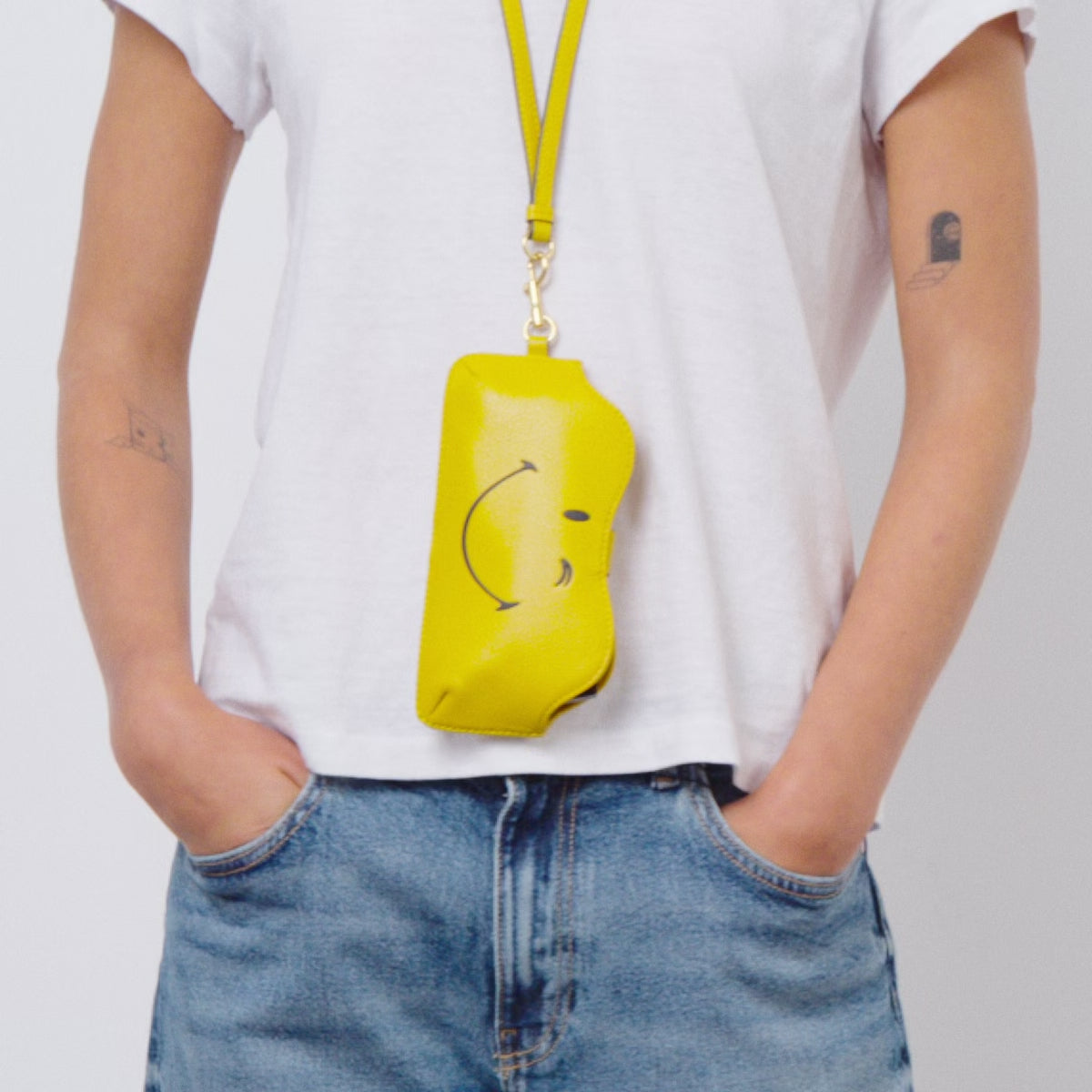 Wink Sunglasses Holder -

          
            Capra Leather in Mustard Yellow -
          

          Anya Hindmarch EU
