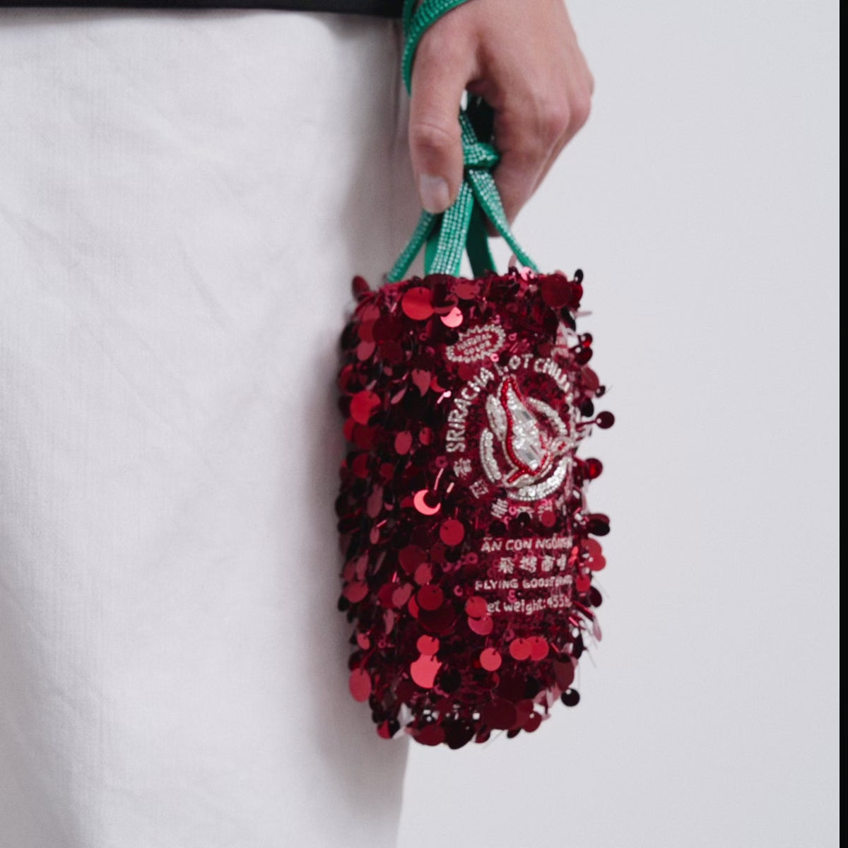 Anya Brands Flying Goose Sriracha Mini Bucket Bag -

          
            Satin/Sequins in Oxblood Red -
          

          Anya Hindmarch EU
