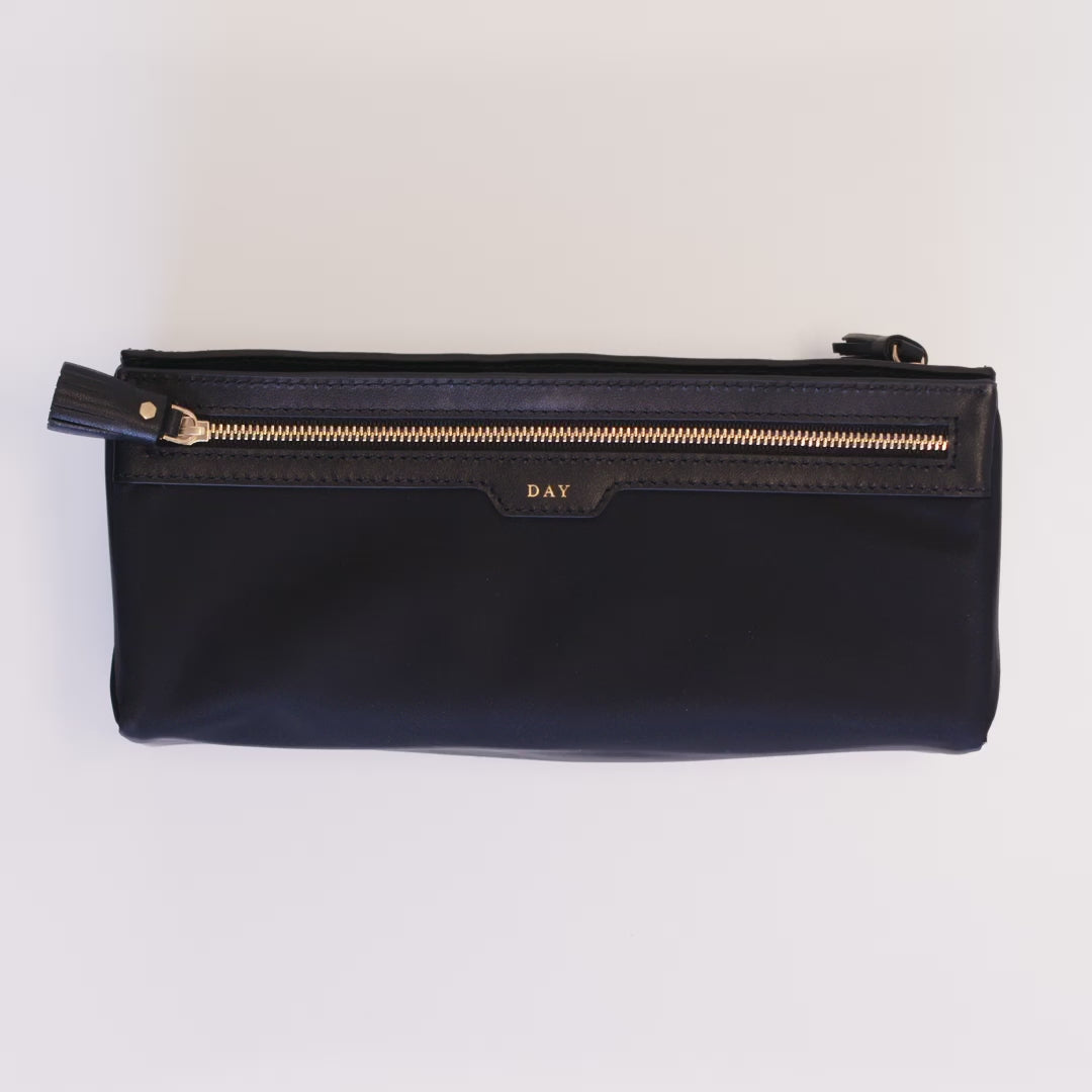 Logo Night and Day Pouch -

          
            Recycled Nylon in Black -
          

          Anya Hindmarch EU

