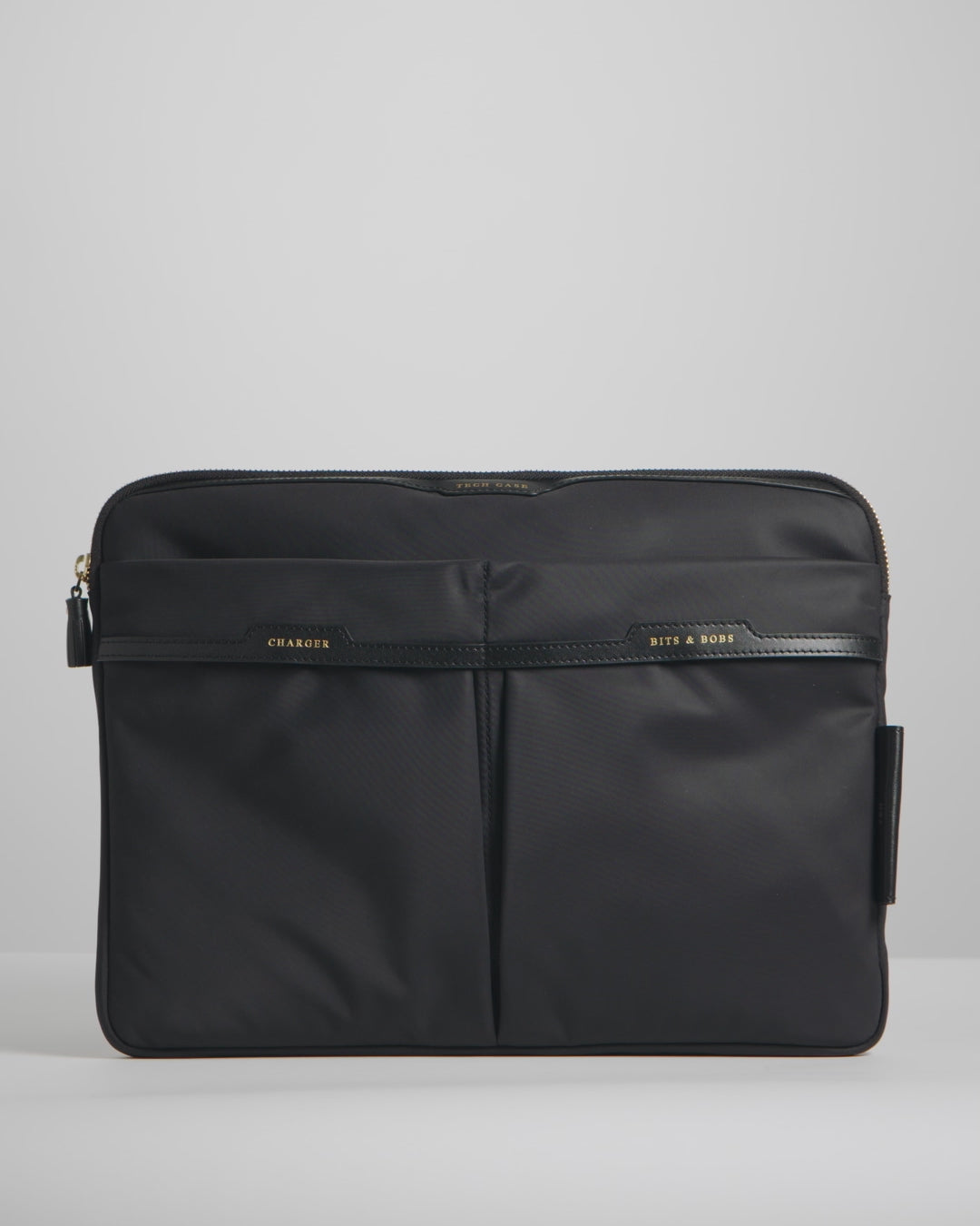 Technology Case -

          
            Econyl® Regenerated Nylon in Black -
          

          Anya Hindmarch EU
