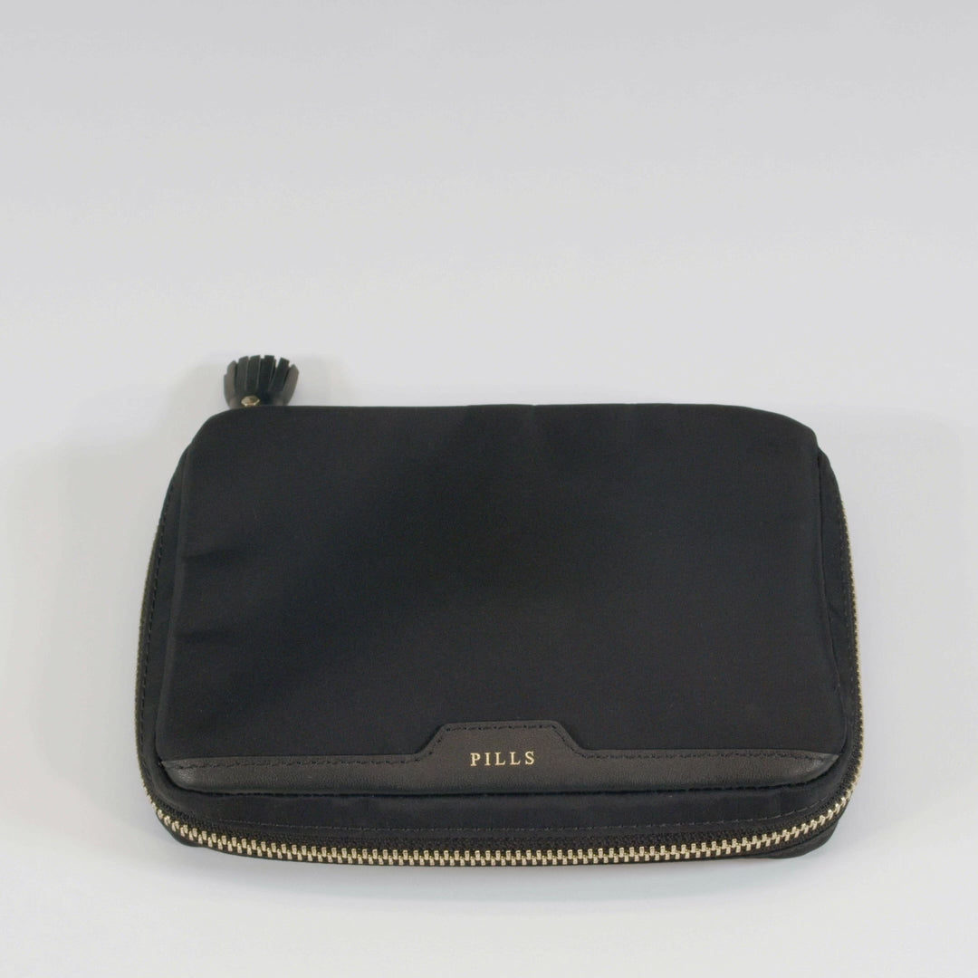 Logo Pills Box -

          
            Jacquard Nylon in Black -
          

          Anya Hindmarch EU
