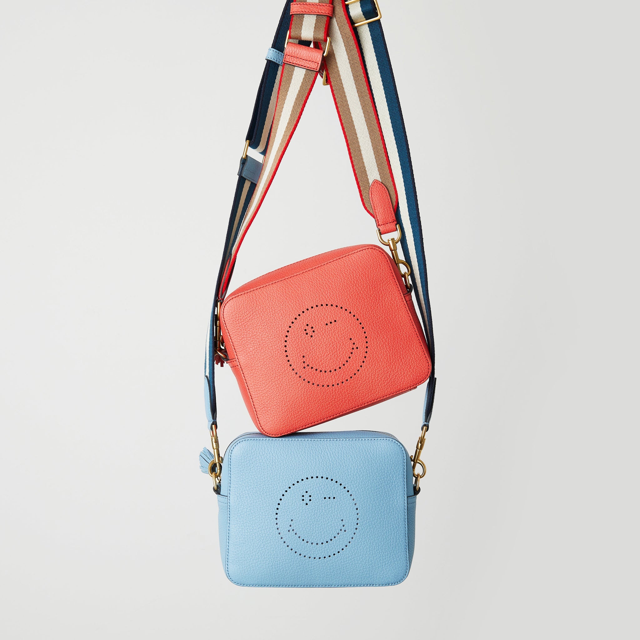 Wink Cross-body -

                  
                    Tumbled Leather in Forget Me Not -
                  

                  Anya Hindmarch EU
