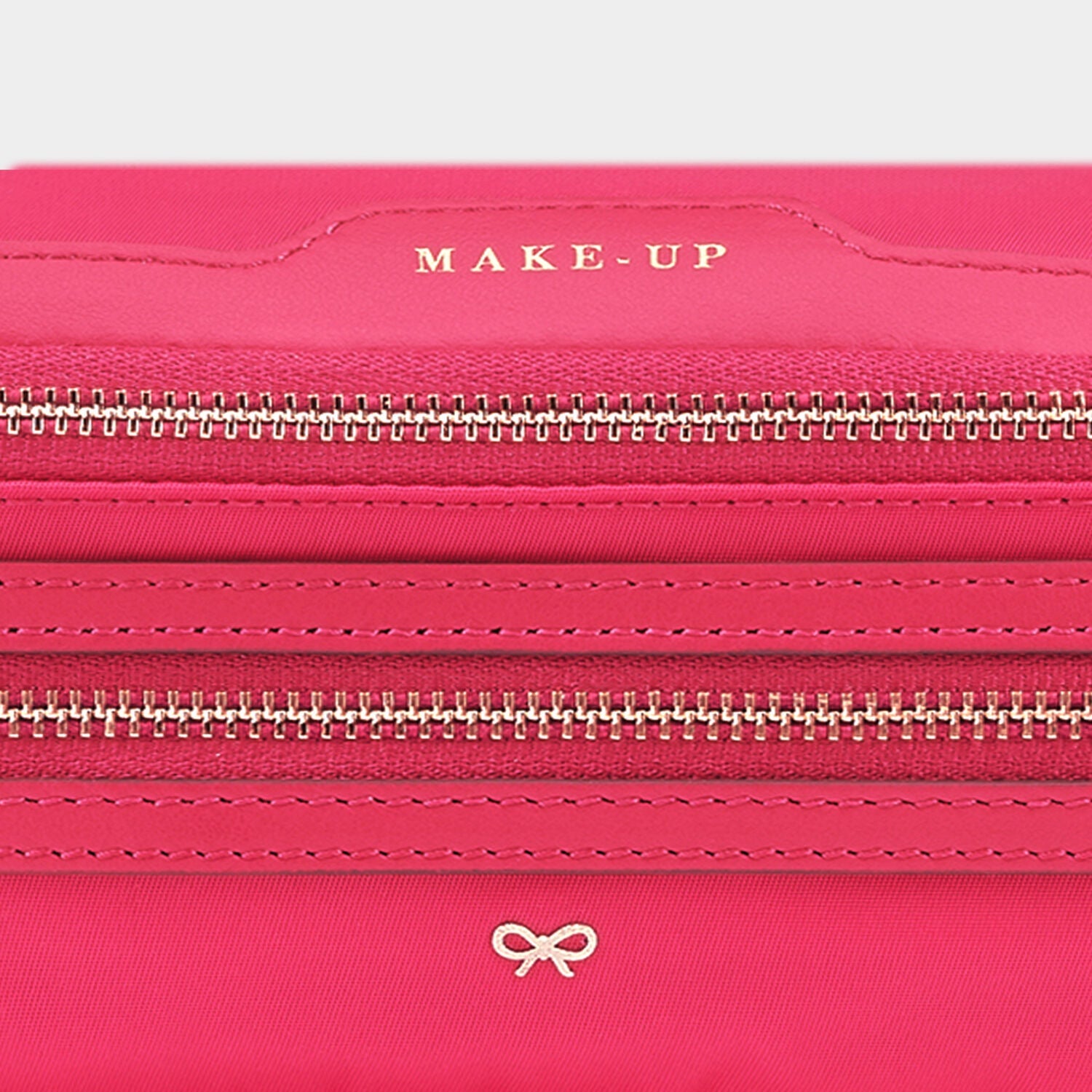 Make-Up Pouch -

                  
                    Econyl® Regenerated Nylon in Hot Pink -
                  

                  Anya Hindmarch EU

