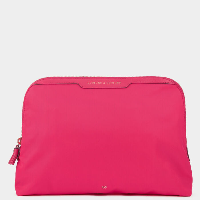 Lotions and Potions Pouch -

                  
                    Econyl® in Hot Pink -
                  

                  Anya Hindmarch EU
