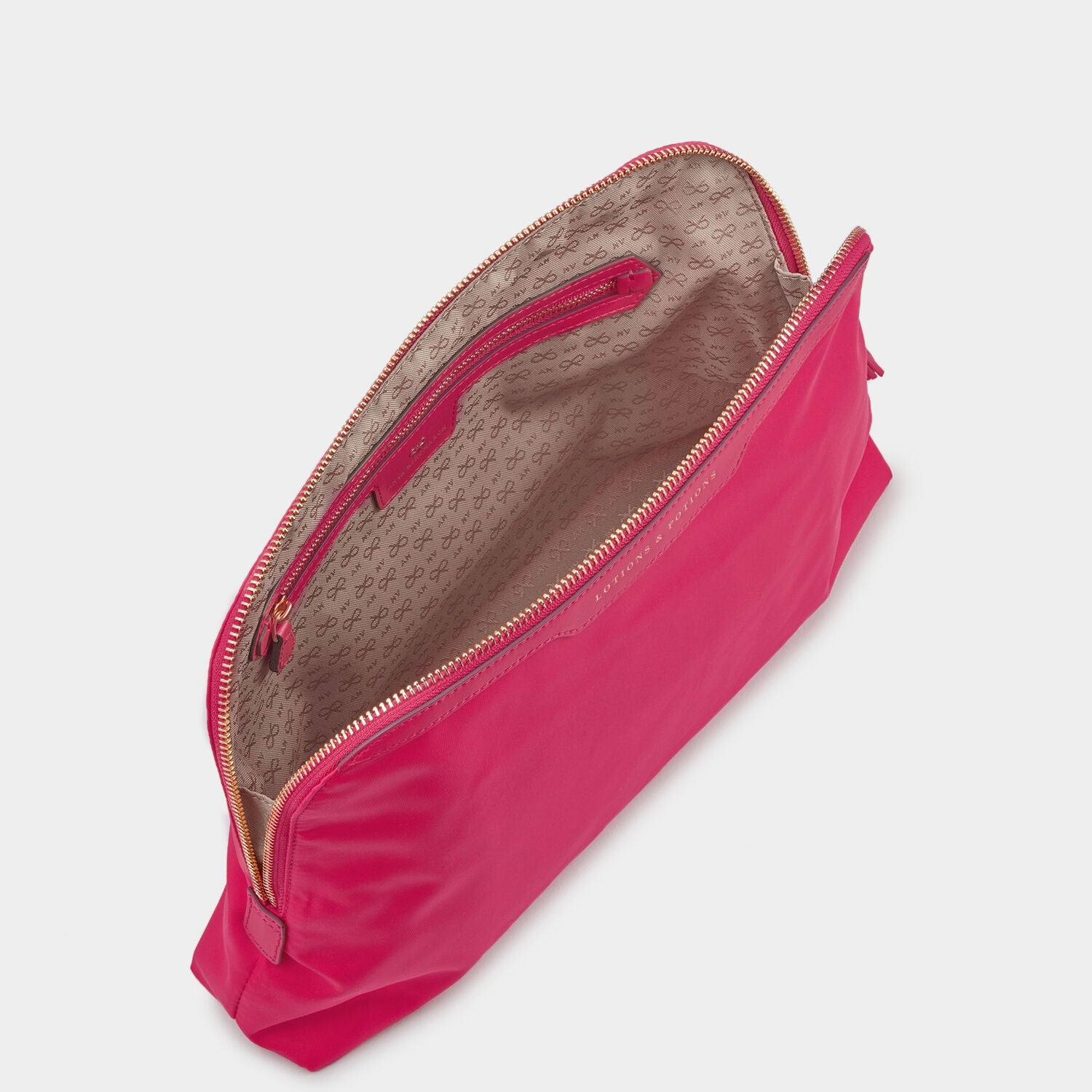 Lotions and Potions Pouch -

                  
                    ECONYL® in Hot Pink -
                  

                  Anya Hindmarch EU
