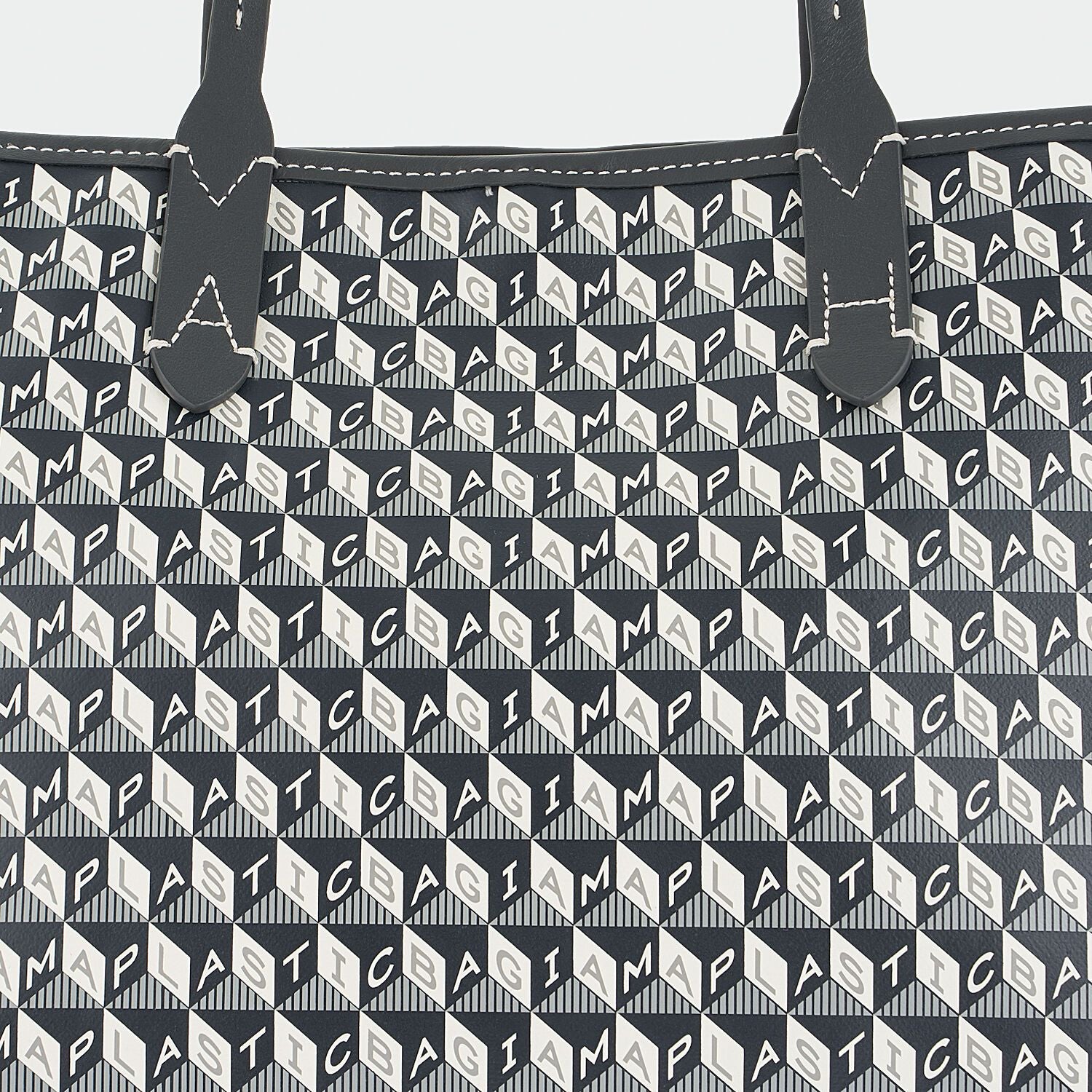 I Am A Plastic Bag Small Tote -

                  
                    Recycled Coated Canvas in Charcoal -
                  

                  Anya Hindmarch EU
