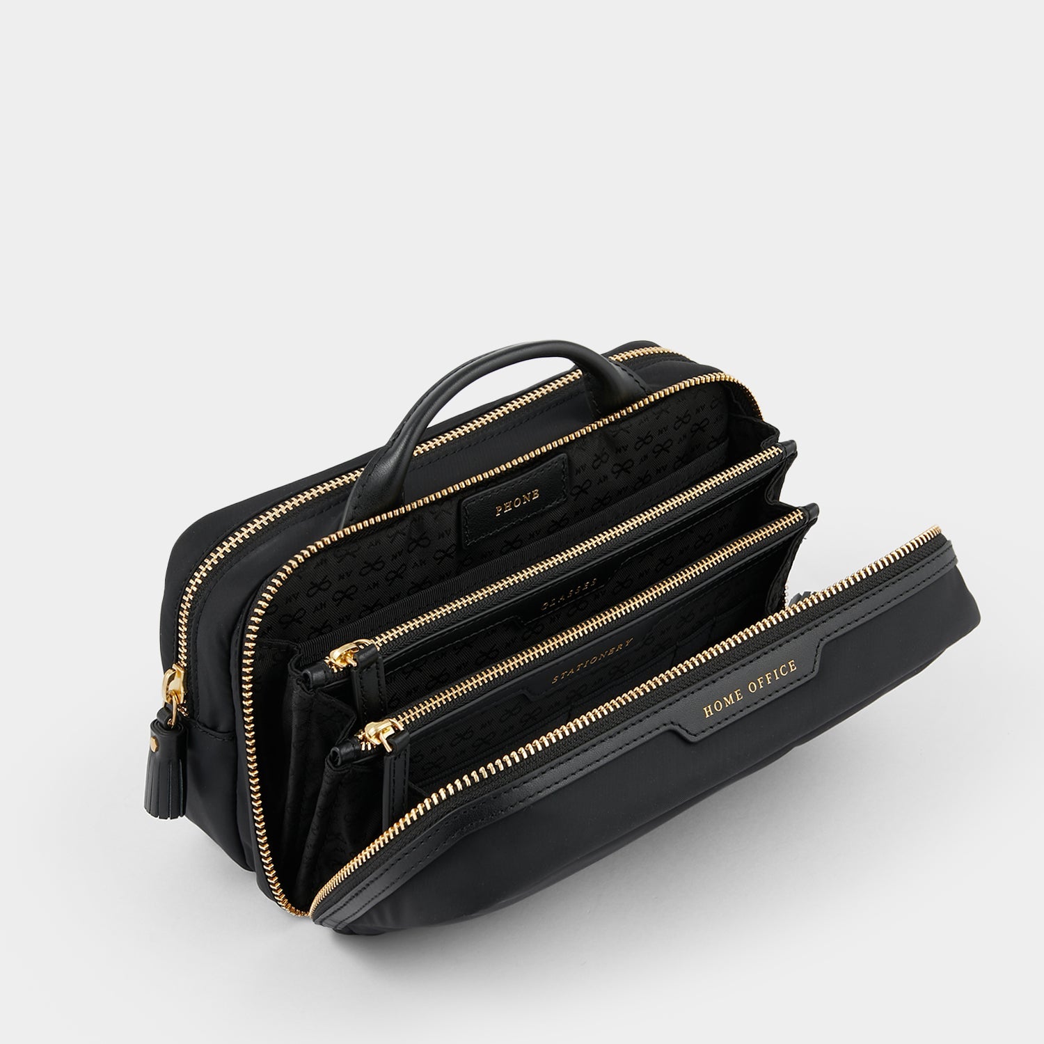Home Office Pouch -

                  
                    Econyl® Regenerated Nylon in Black -
                  

                  Anya Hindmarch EU
