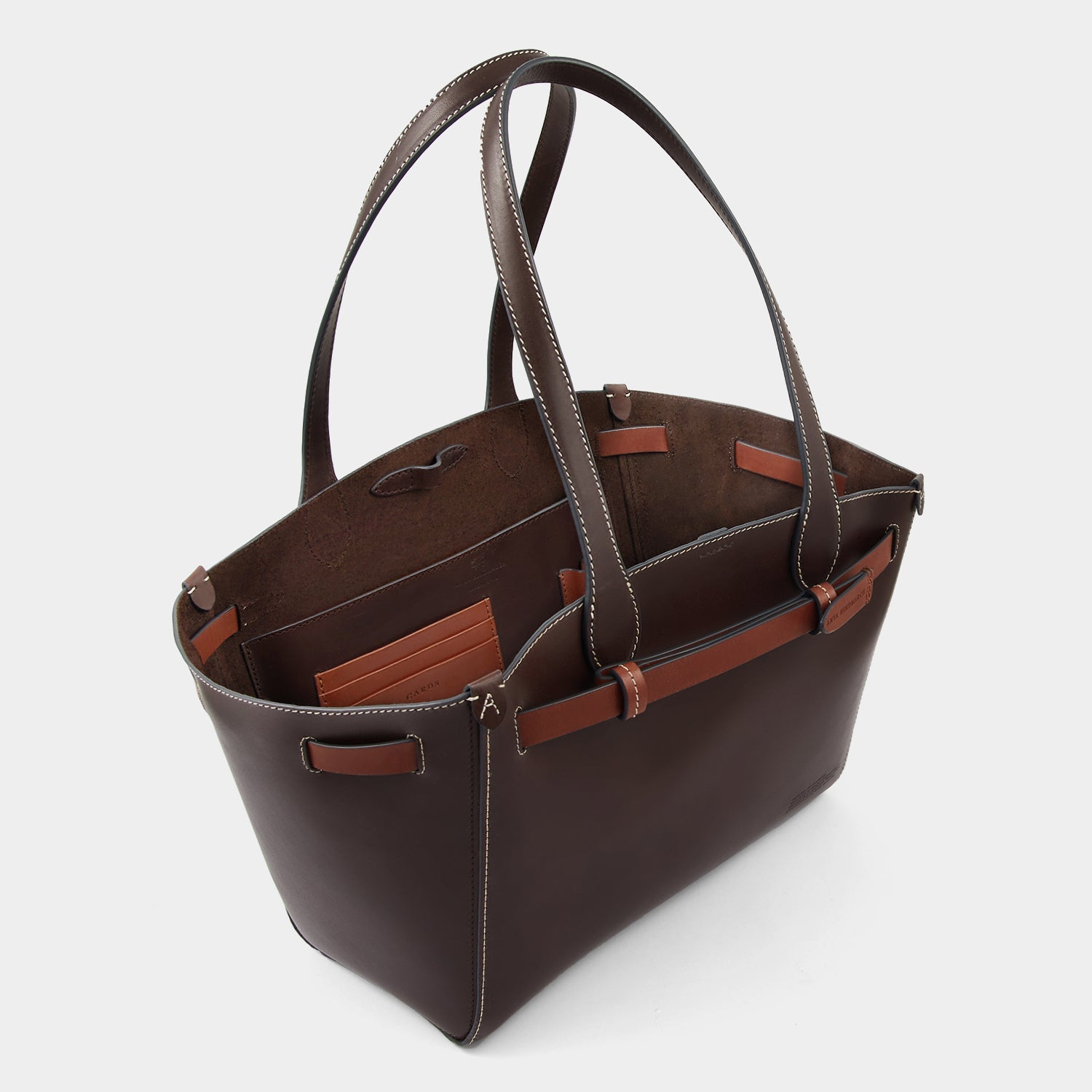 Return to Nature Tote Small -

                  
                    Compostable Leather in Cigar -
                  

                  Anya Hindmarch EU
