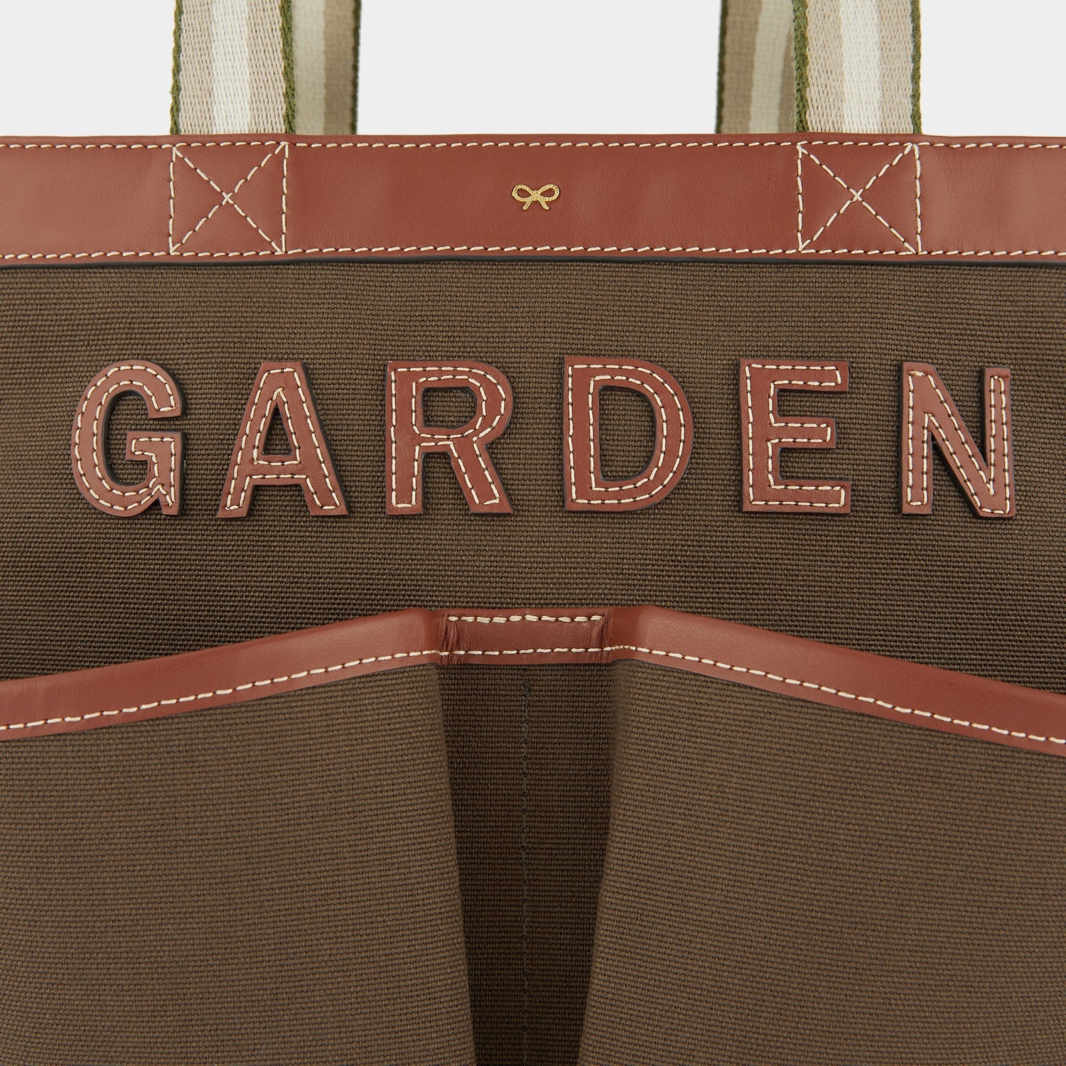 Gardening Tote -

                  
                    Recycled Canvas in Olive -
                  

                  Anya Hindmarch EU
