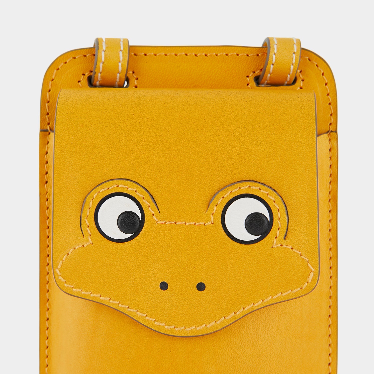 Return to Nature Phone Pouch on Strap -

                  
                    Compostable Leather in Honey -
                  

                  Anya Hindmarch EU
