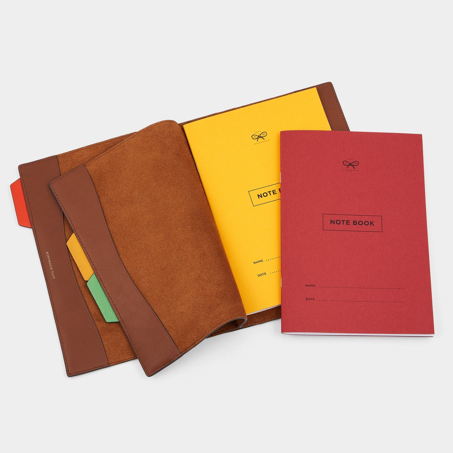 A5 Notebook Holder -

                  
                    Polished Leather in Tan -
                  

                  Anya Hindmarch EU
