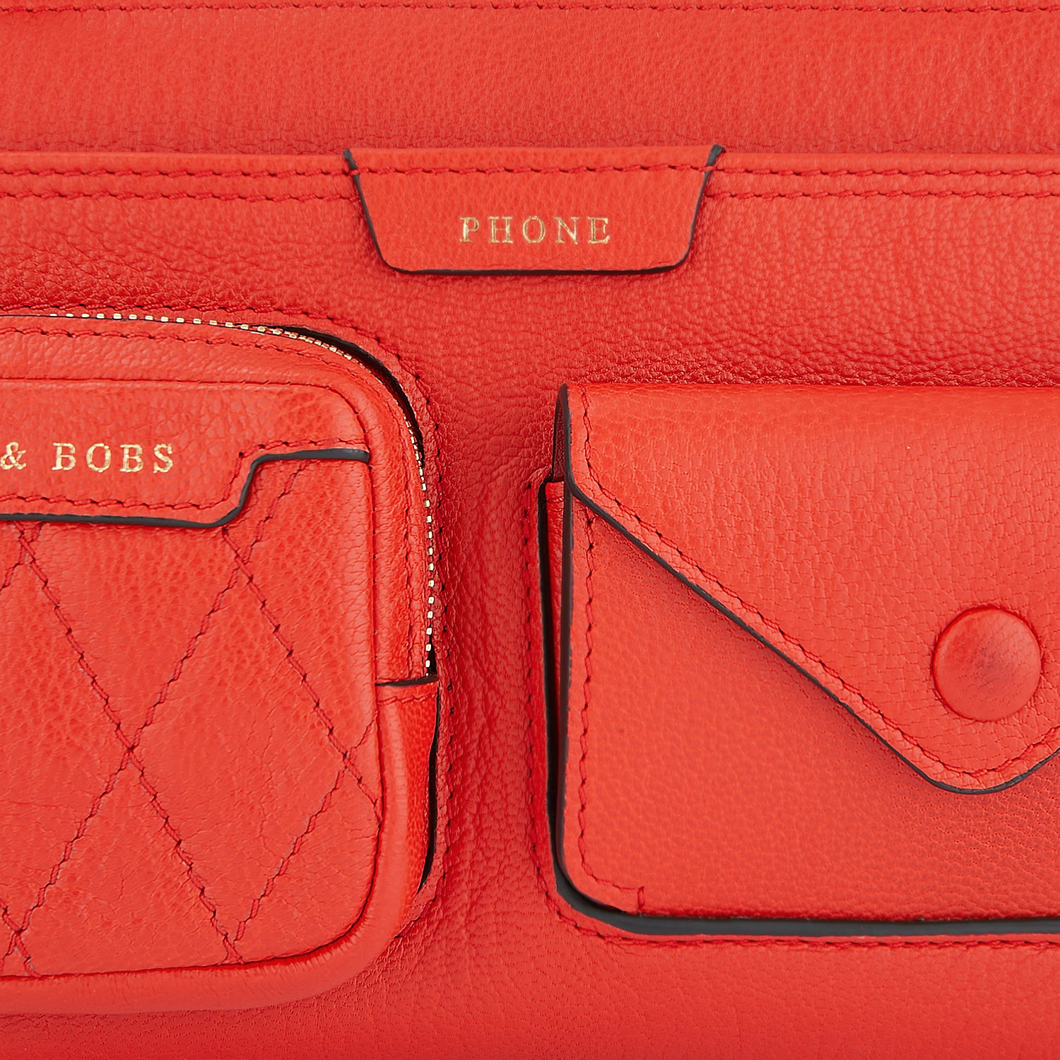 Multi Pocket Pouch on Strap -

                  
                    Shiny Grain Leather in Flame Red -
                  

                  Anya Hindmarch EU

