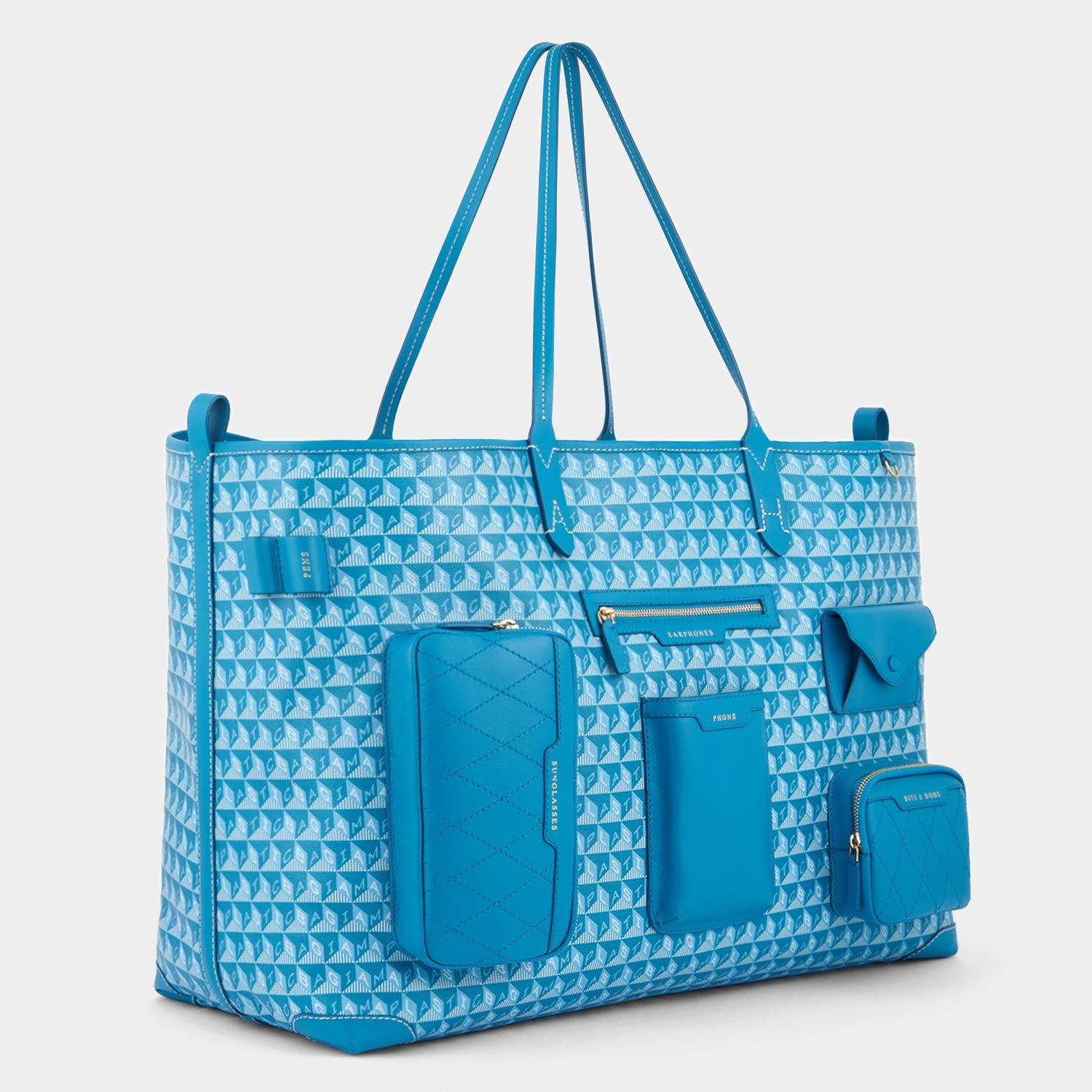 I am a Plastic Bag XL Multi Pocket Tote -

                  
                    Recycled Canvas in Peacock -
                  

                  Anya Hindmarch EU
