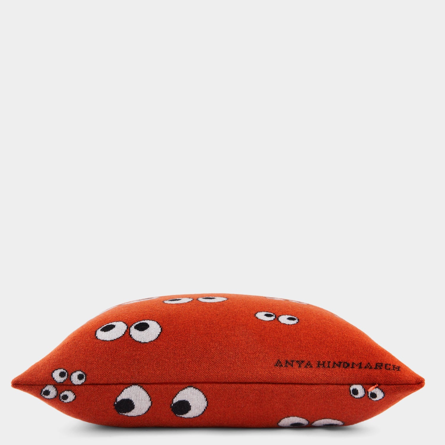 All Over Eyes Cushion -

                  
                    Lambswool in Dark Clementine -
                  

                  Anya Hindmarch EU

