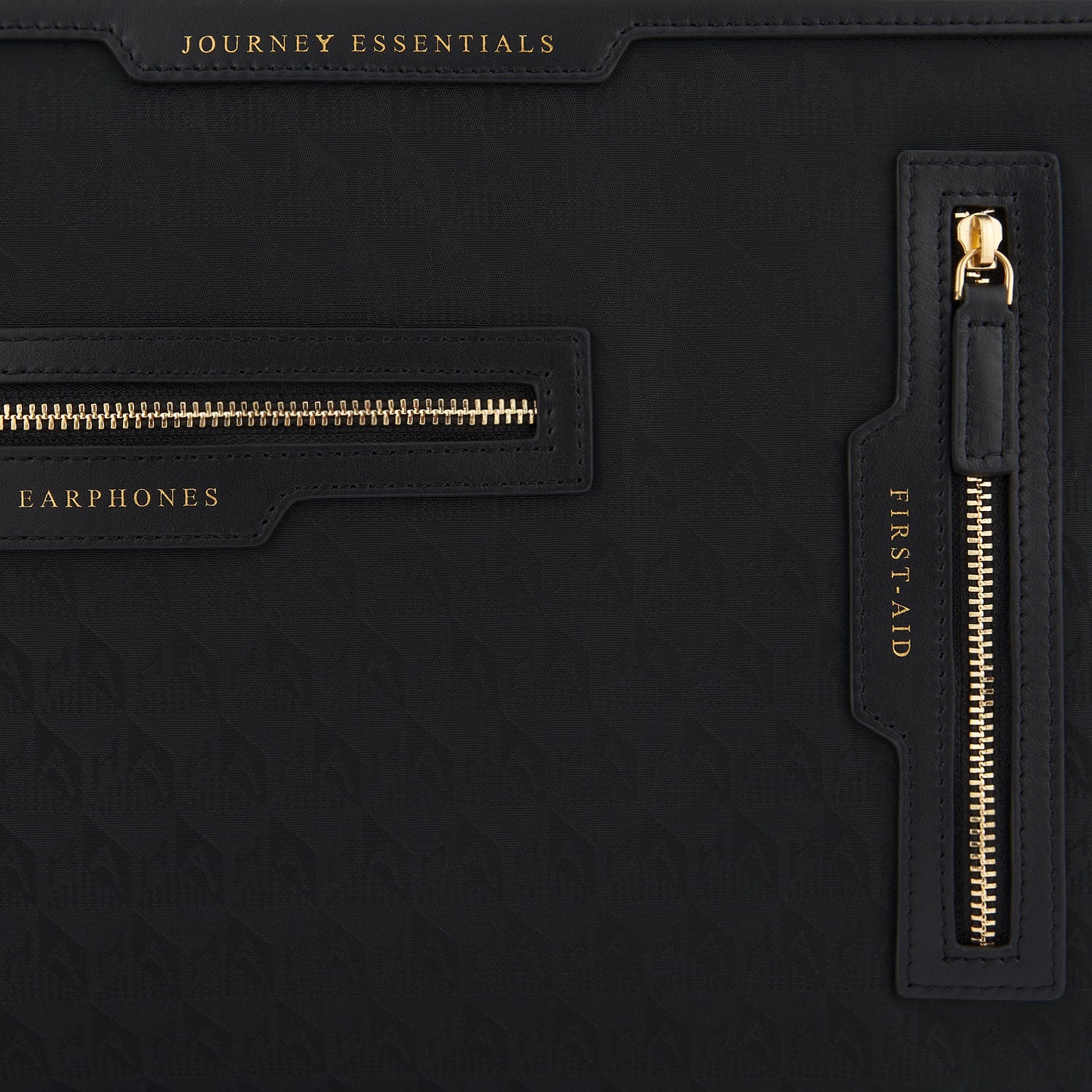 Logo Journey Essentials Pochette -

                  
                    Jacquard Nylon in Black -
                  

                  Anya Hindmarch EU
