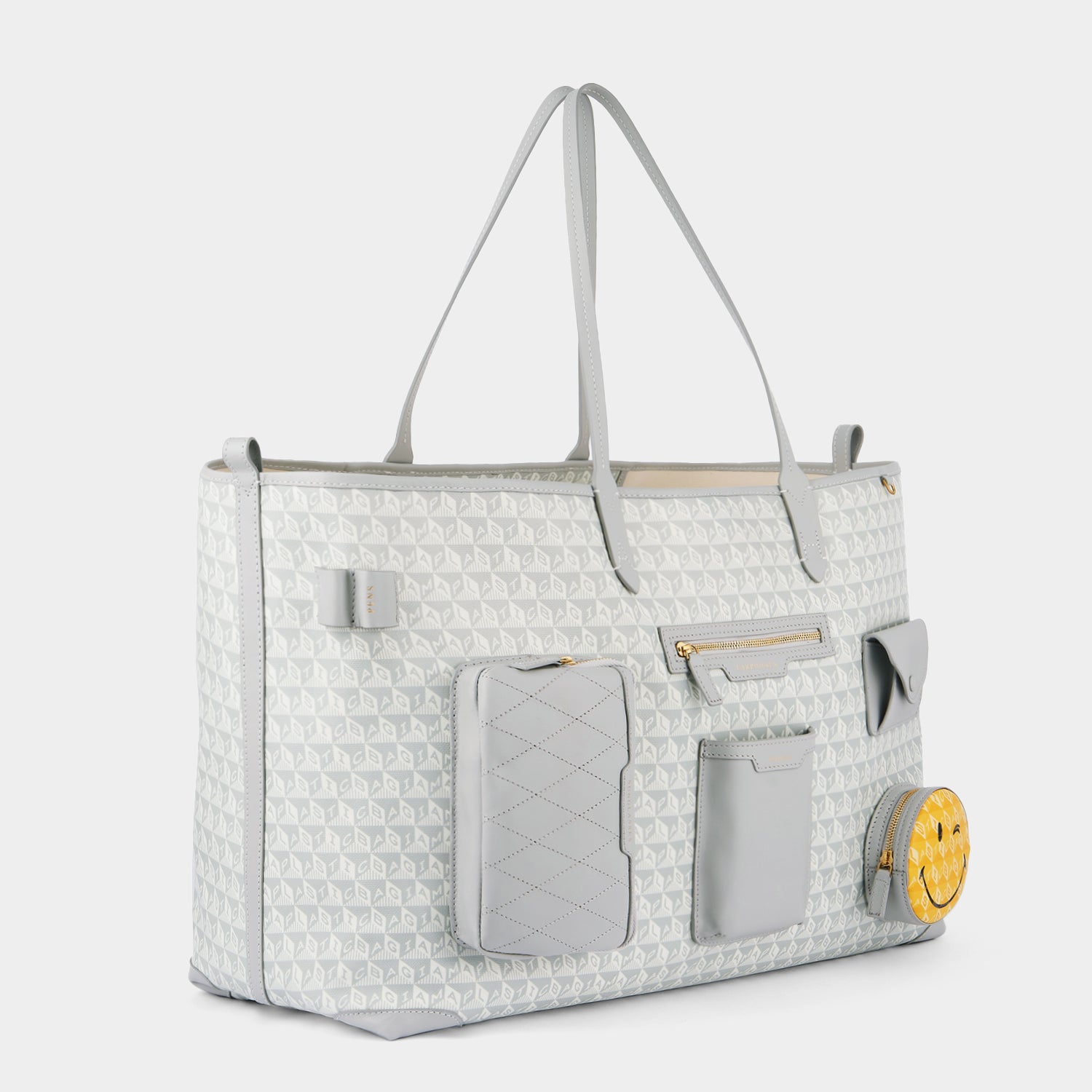 I am a Plastic Bag Wink XL Tote -

                  
                    Recycled Canvas in Frost -
                  

                  Anya Hindmarch EU
