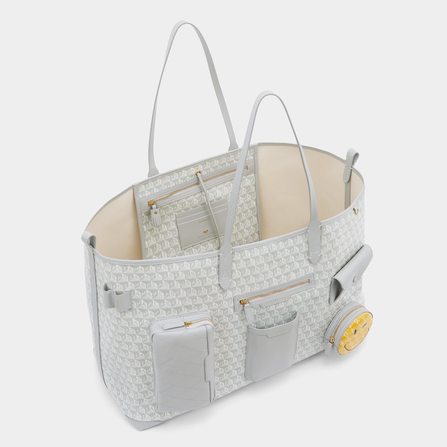 I am a Plastic Bag XL Wink Tote -

                  
                    Recycled Canvas in Frost -
                  

                  Anya Hindmarch EU

