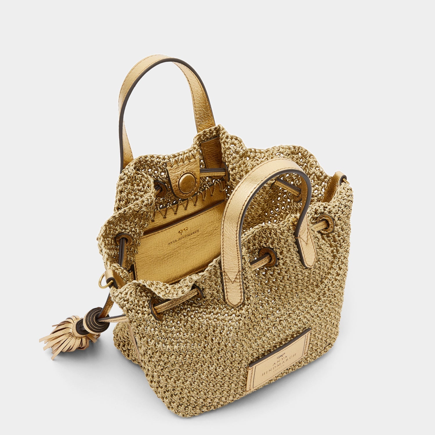 Lurex Drawstring Small Tote -

                  
                    Leather in Gold -
                  

                  Anya Hindmarch EU
