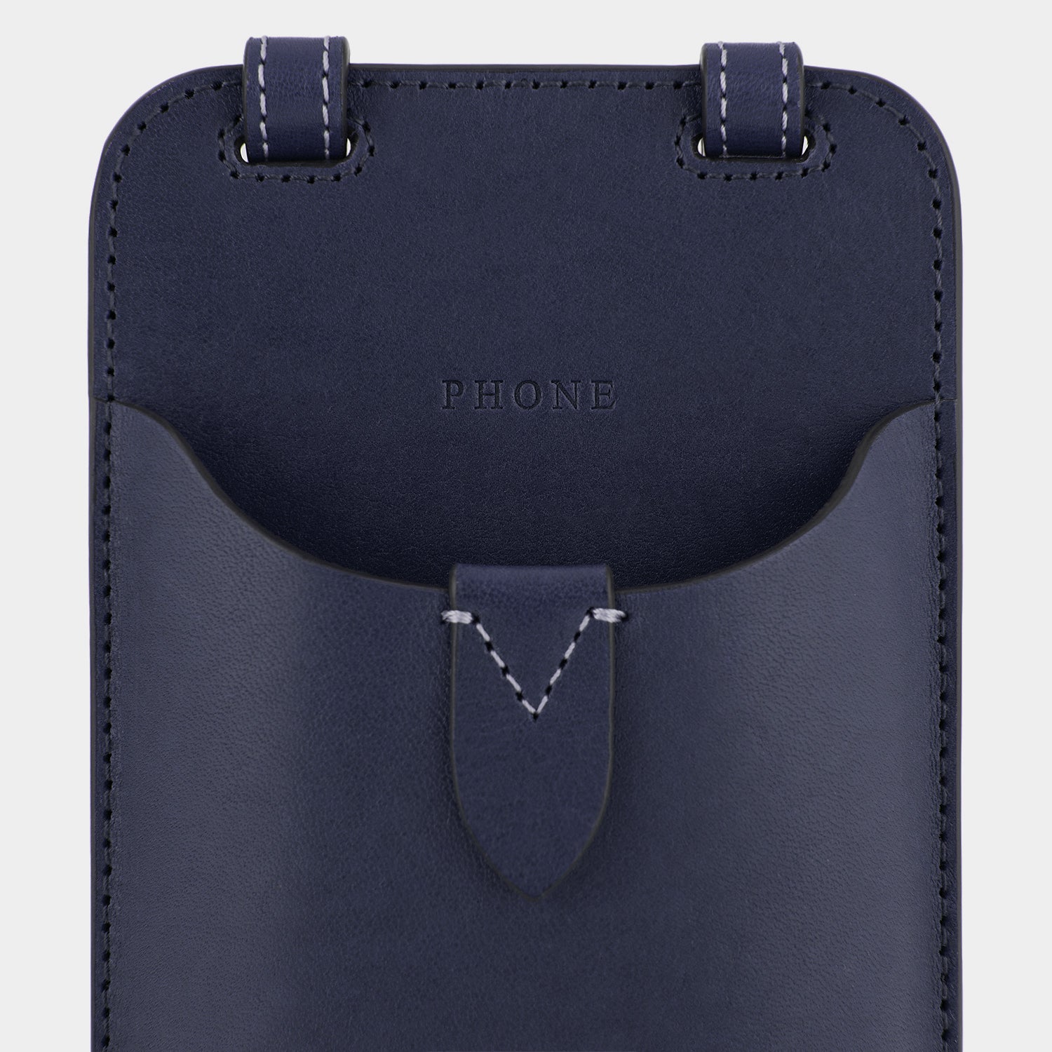 Return to Nature Phone Pouch on Strap -

                  
                    Compostable Leather in Marine -
                  

                  Anya Hindmarch EU
