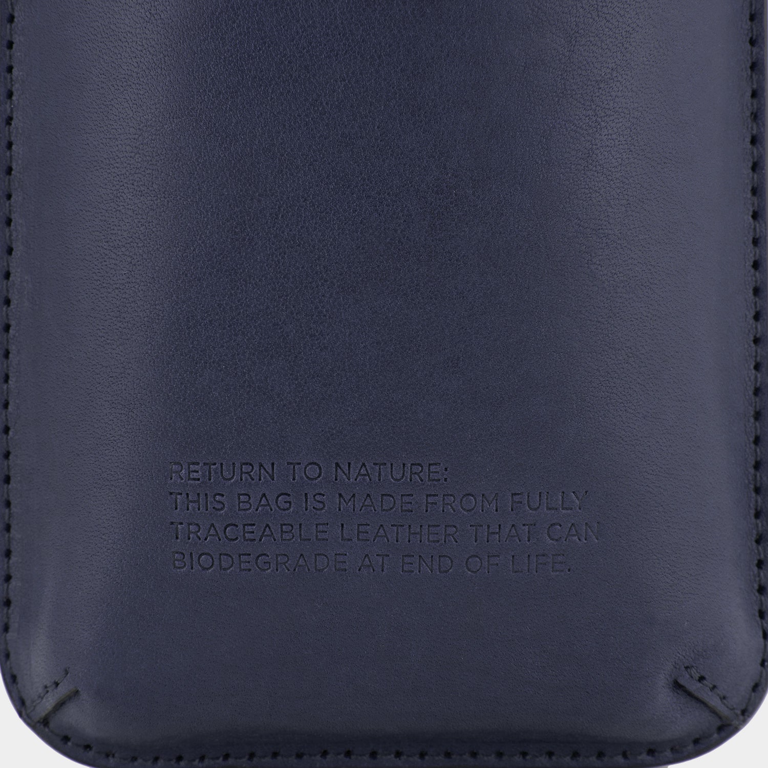 Return to Nature Phone Pouch on Strap -

                  
                    Compostable Leather in Marine -
                  

                  Anya Hindmarch EU
