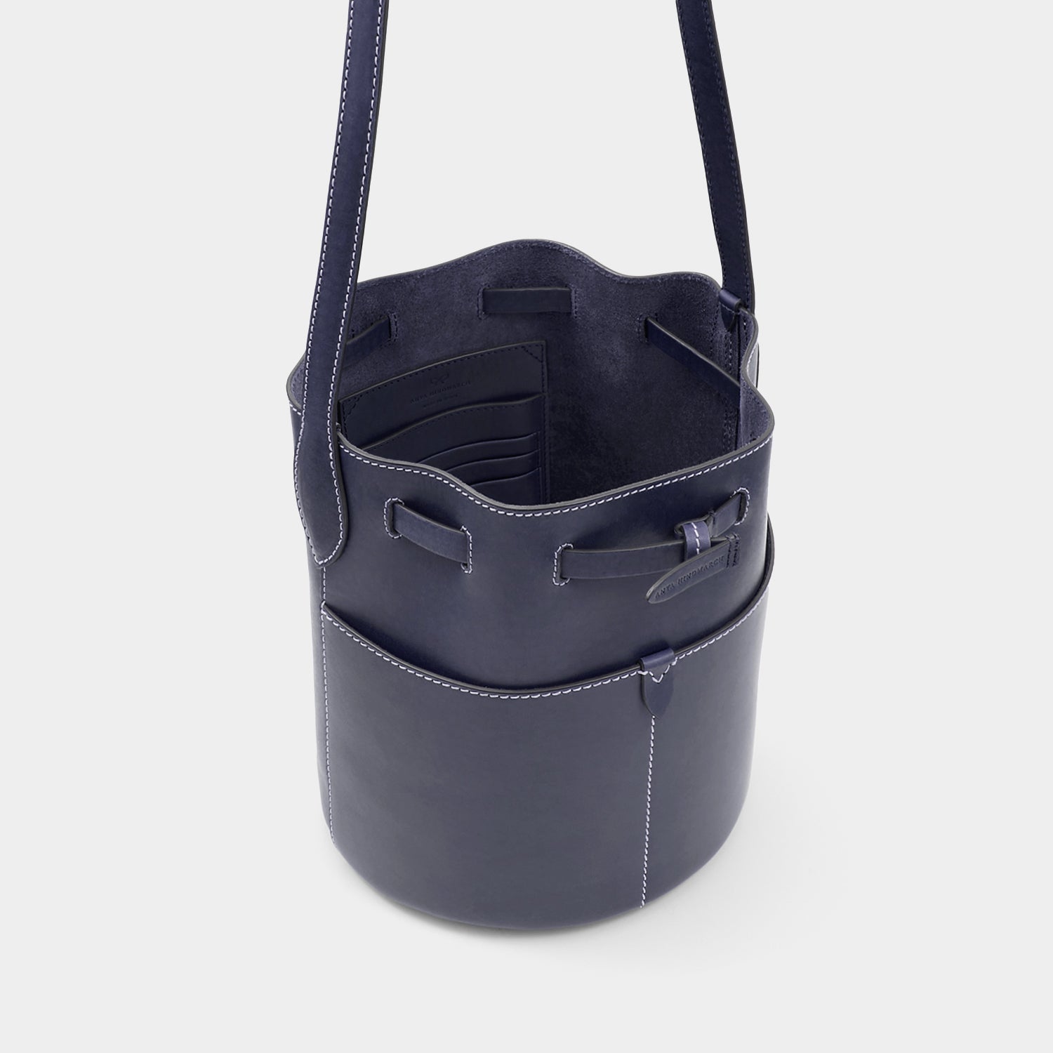 Return to Nature Small Bucket Bag -

                  
                    Compostable Leather in Marine -
                  

                  Anya Hindmarch EU
